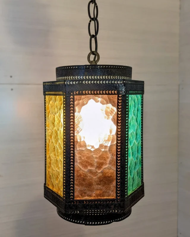 EDIT: Sold, thanks!If you're looking to bring some groovy charm into your living space, it doesn't get better than this vintage 1970's stained glass pendant swag light. Featuring orange, green, yellow, and blue panels, this light has character to spare. The punched steel casing gives a bit of a Moroccan decor vibe. No cracks in the glass and the fixture is in good shape overall. Light measures 7"W x 12"H and there is roughly 6 feet of chainSeattleID: 94294$155You can place a 24 hour hold on this item by calling (206) 624-4510 and requesting a hold on item ID 94294#Lighting #1970s #70sLighting #LightFixture #PendantSwagLight #StainedGlass #StainedGlassLight #HomeDecor #Swag #SwagLight #Salvage #Earthwise #Seattle