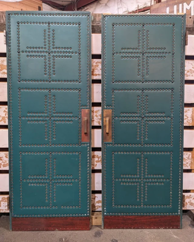 Do you like your doors with some extensive local history? These heavy duty doors, covered in green vinyl with weathered brass studs were first salvaged from Seattle's St. James Cathedral, which has overlooked First Hill since 1907. Then they were used at the longtime Kenmore Italian restaurant Mia Roma until its closure in 2015. Recently, Earthwise was contacted by the family who ran Mia Roma who were looking to pass on all the remaining fixtures and art from the restaurant, which included these fascinating doors. Now you can own this unique chunk of Seattle history and add a ton of character to any doorway. In good shape for its age, only significant damage is the missing top strip of the right side of the door, visible in the photos. Go see these doors in person today at our Kenmore store!Measures 60"W (total) x 79"H x 2"DKenmoreID: 96184$1450You can place a 24 hour hold on this item by calling (425) 481-0245 and requesting a hold on item ID 96184#Doors #AntiqueDoors #VintageDoors #Vinyl #StuddedDoors #Medieval #CatholicChurchDecor #Italtian #MiaRoma #StJamesCathedral #FirstHill #OldSeattle #CatholicChurch #NewPope #PopeLeo #Kenmore #Italy #SalvagedDoors #Earthwise #Salvage