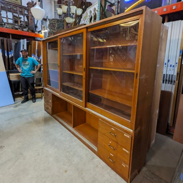 Attn: Eckstein Middle School alumni! Want to own a piece of your old school? This massive CVG fir built-in cabinet is from the 1950's and it has oodles of character from many decades of school years! The upper cabinets have sliding glass doors and the drawers below provide tons of storage. This would look super classy in a craftsman home's living room or could work great in a retail space as a display case. Drawers and edges have some wear and tear, but overall it's in good shape and will surely last another lifetime or two. We have two identical cabinets in stock, both from Eckstein in North Seattle.Measures 112"W x 80.5"H x 18"DSeattleID: 97899$2500You can place a 24 hour hold on this item by calling (206) 624-4510 and requesting a hold on item ID 97899#Cabinets #EcksteinMiddleSchool #Eckstein #BuiltIn #CVG #Fir #DisplayCase #MiddleSchool #SchoolFurniture #1950s #Vintage #Retro #Retail #Antique #PublicSchools #SeattleSchools #Ravenna #ViewRidge #Earthwise #Salvage #Seattle