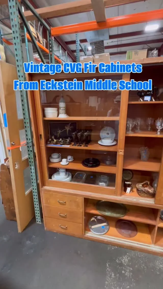 Eckstein Middle School alumni! Want to own a piece of your old school? This massive CVG fir built-in cabinet is from the 1950’s and it has oodles of character from many decades of school years! The upper cabinets have sliding glass doors and the drawers below provide tons of storage. This would look super classy in a craftsman home’s living room or could work great in a retail space as a display case. Drawers and edges have some wear and tear, but overall it’s in good shape and will surely last another lifetime or two. We have four identical cabinets in stock, two in Kenmore and two in Seattle, all from Eckstein in North Seattle.Measures 112”W x 80.5”H x 18”DSeattle and Kenmore ID: 97899$2500You can place a 24 hour hold on this item by calling (206) 624-4510 and requesting a hold on item ID 97899#Cabinets #EcksteinMiddleSchool #Eckstein #BuiltIn #CVG #Fir #DisplayCase #MiddleSchool #SchoolFurniture #1950s #Vintage #Retro #Retail #Antique #PublicSchools #SeattleSchools #Ravenna #ViewRidge #Earthwise #Salvage #Seattle #Kenmore
